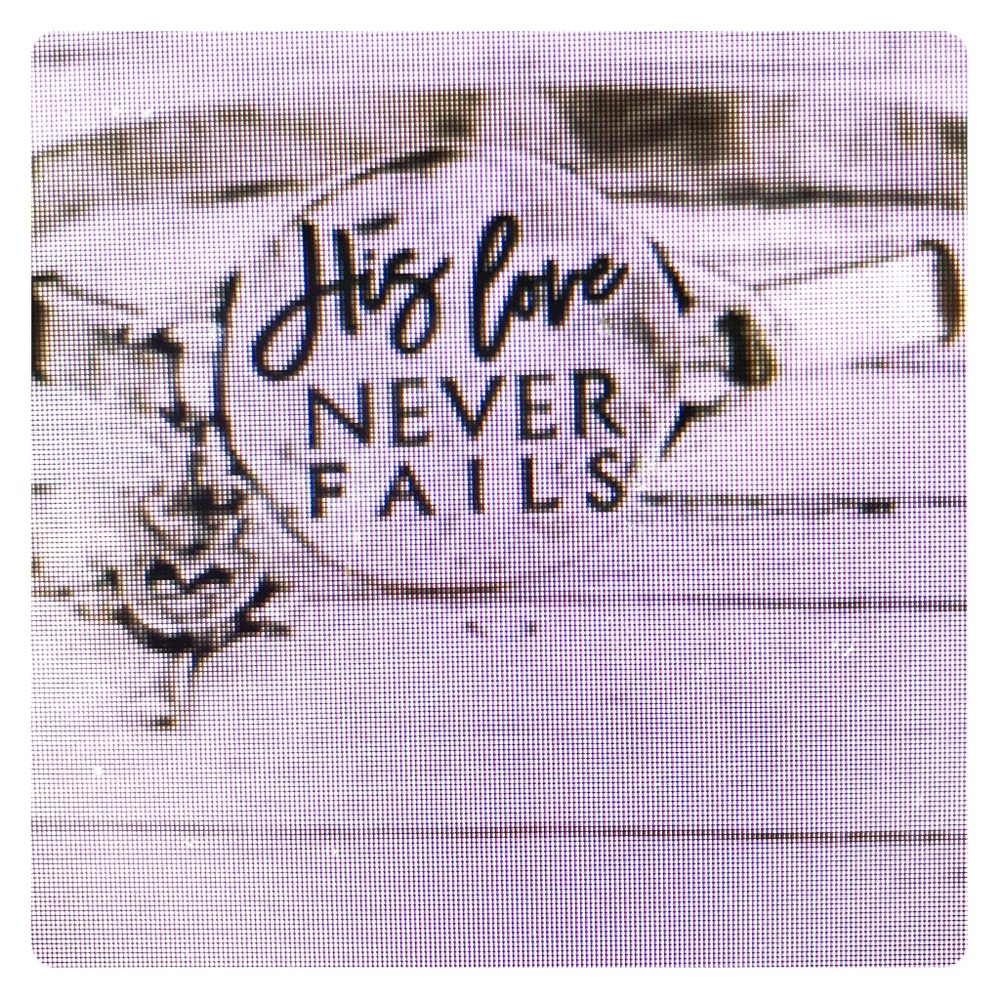 Burnished Silvertone “His Love never Fails”